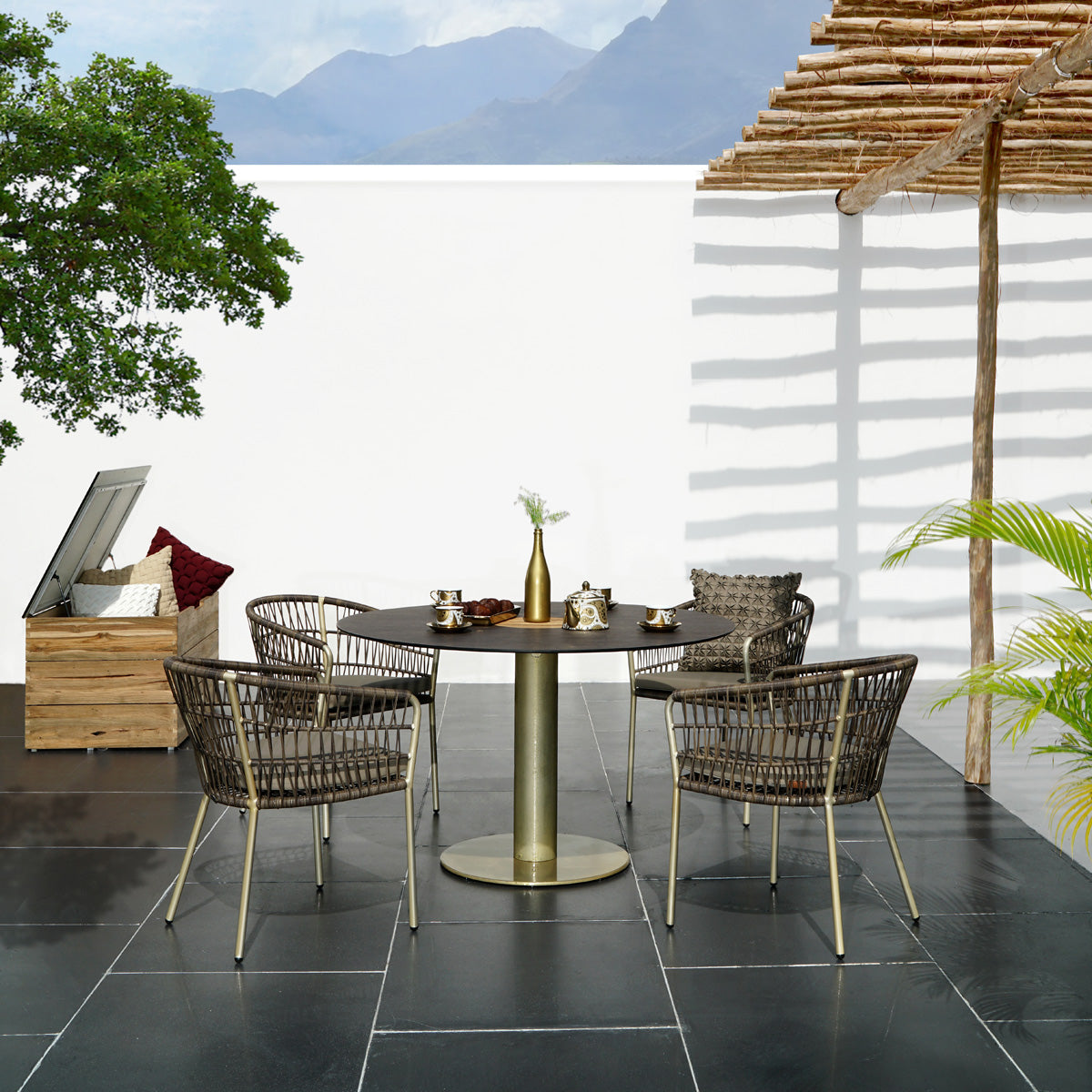 Stizzy Small Pedestal Dining Table by Mamagreen, showing stizzy small pedestal dining table in live shot.