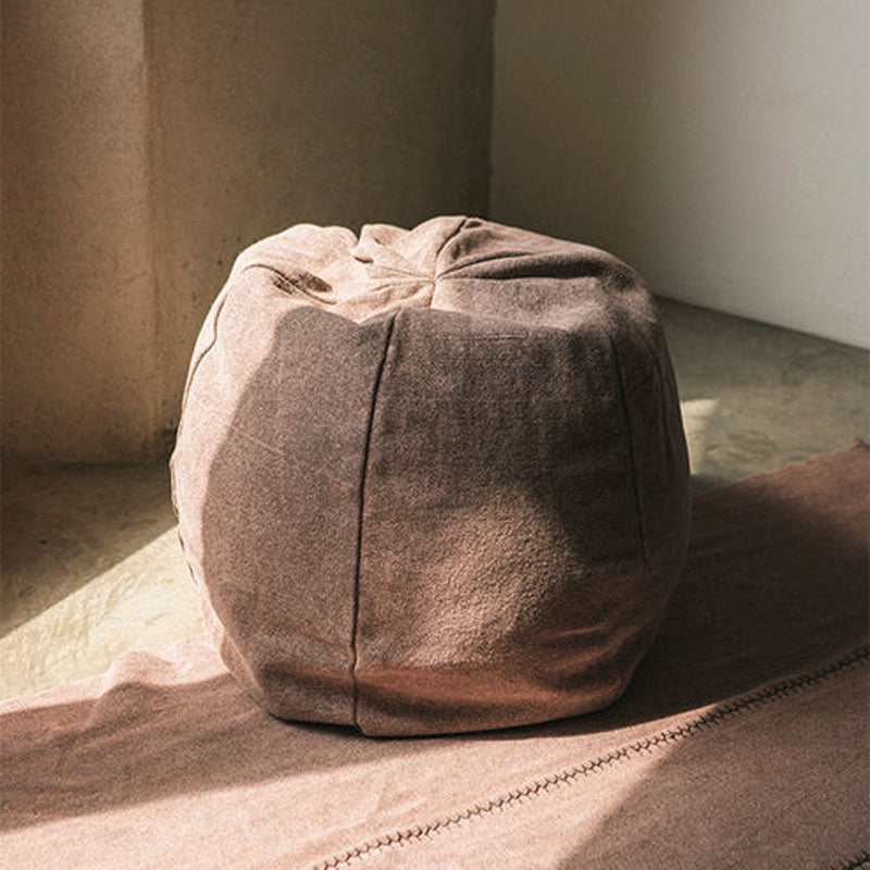 Stonewashed Pouf by Lorena Canals, showing stonewashed pouf in live shot.