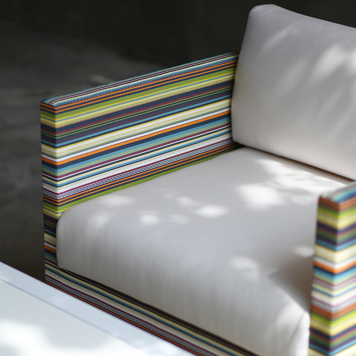 Stripe 1-Seater Sofa by Mamagreen, showing closeup view of stripe 1-seater sofa in live shot.