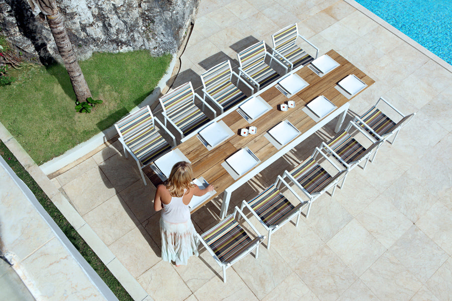Stripe Stackable Armchair by Mamagreen, showing stripe stackable armchairs in live shot.