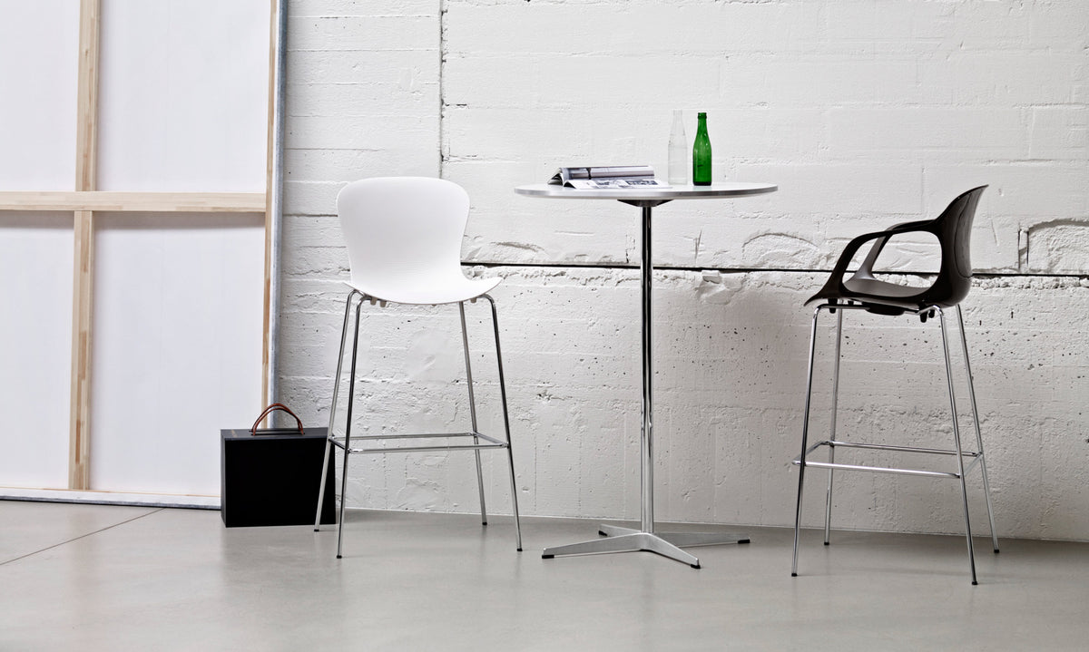 Supercircular Bar Table by Fritz Hansen, showing supercircular bar table in live shot.