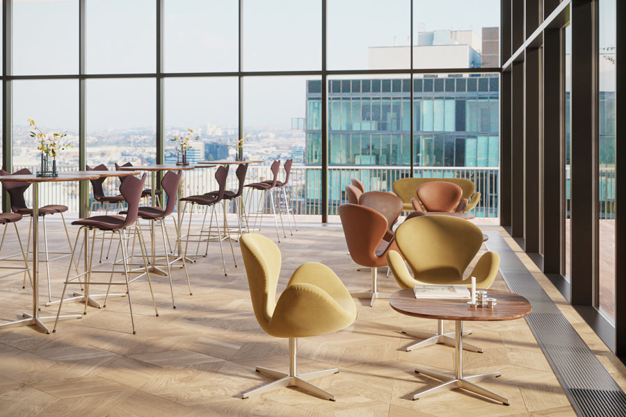 Supercircular Coffee Table by Fritz Hansen, showing supercircular coffee tables in live shot.