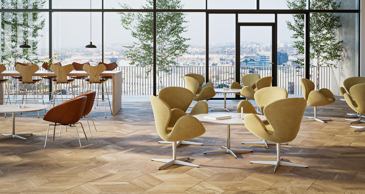 Supercircular Coffee Table by Fritz Hansen, showing supercircular coffee tables in live shot.
