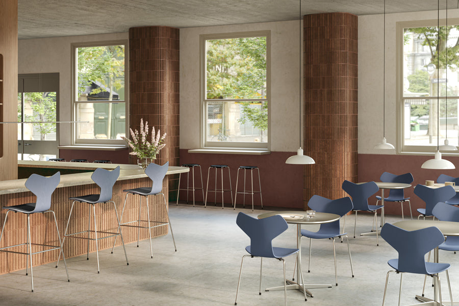 Supercircular Table by Fritz Hansen, showing supercircular tables in live shot.