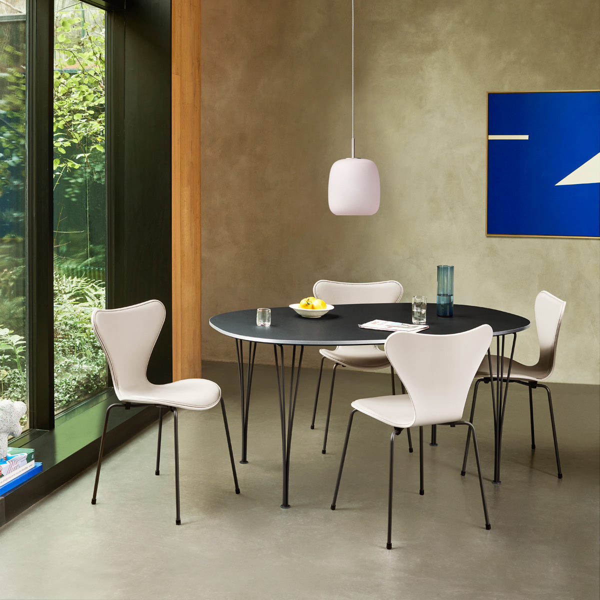 Superellipse Table by Fritz Hansen, showing superellipse table in live shot.