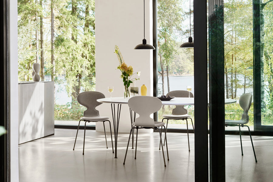 Superellipse Table by Fritz Hansen, showing superellipse table in live shot.