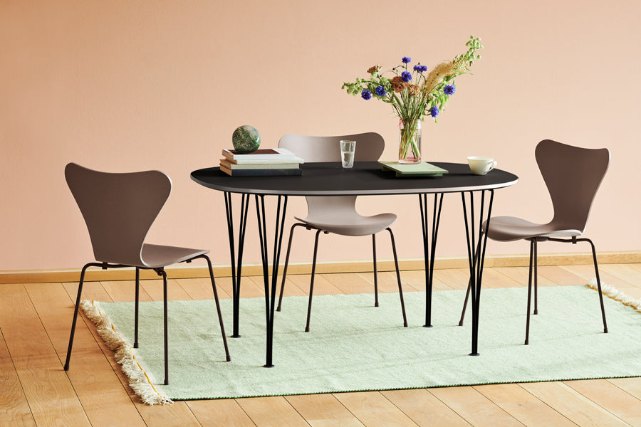 Superellipse Table by Fritz Hansen, showing superellipse table in live shot.