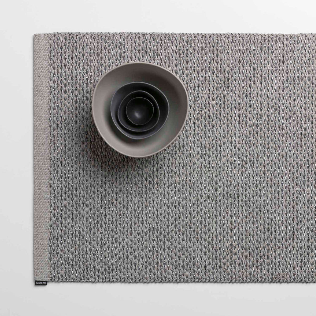 Svea Fossil Grey Runner Rug by Pappelina, showing svea fossil grey runner rug in live shot.