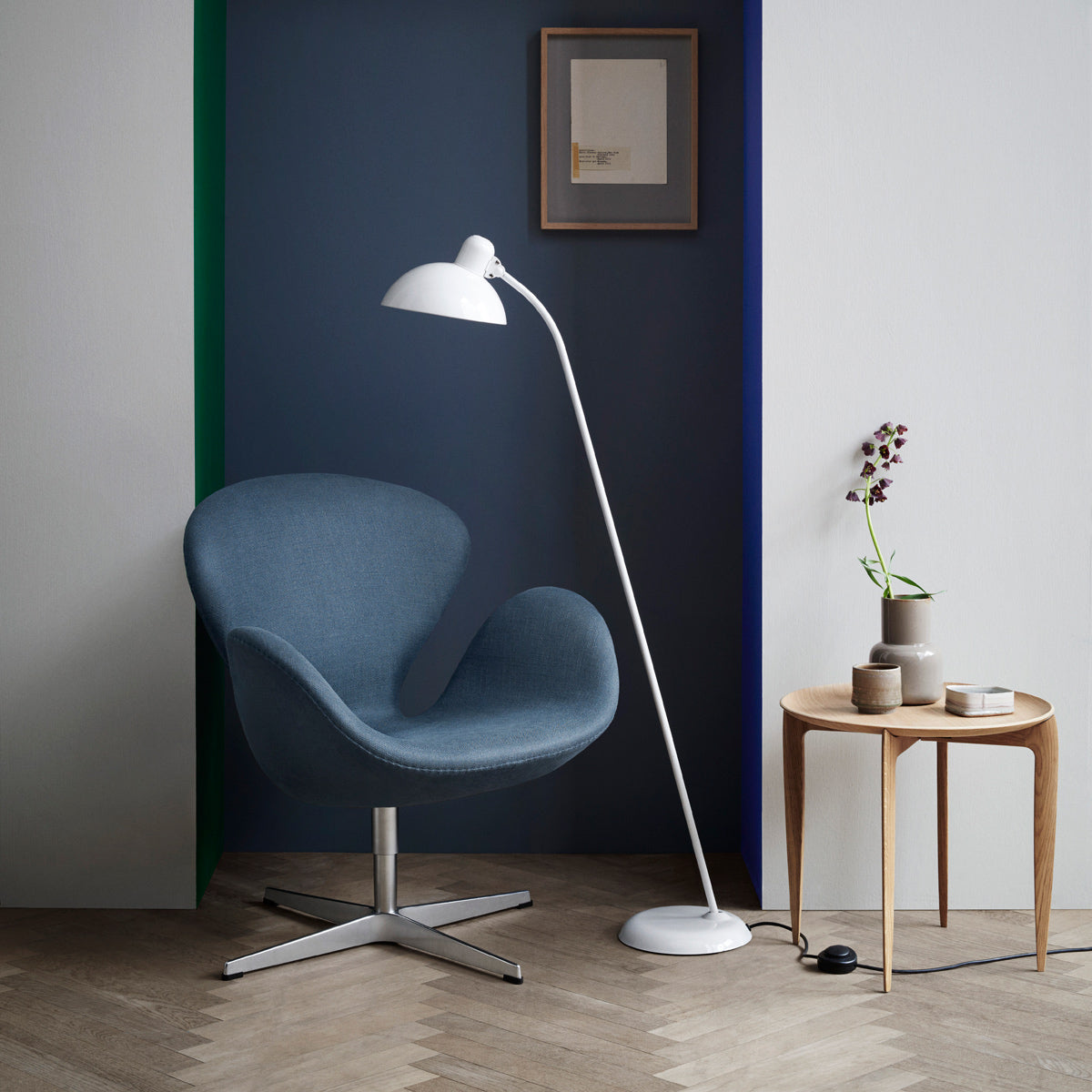 Swan Lounge Swivel Chair by Fritz Hansen, showing swan lounge swivel chair in live shot.