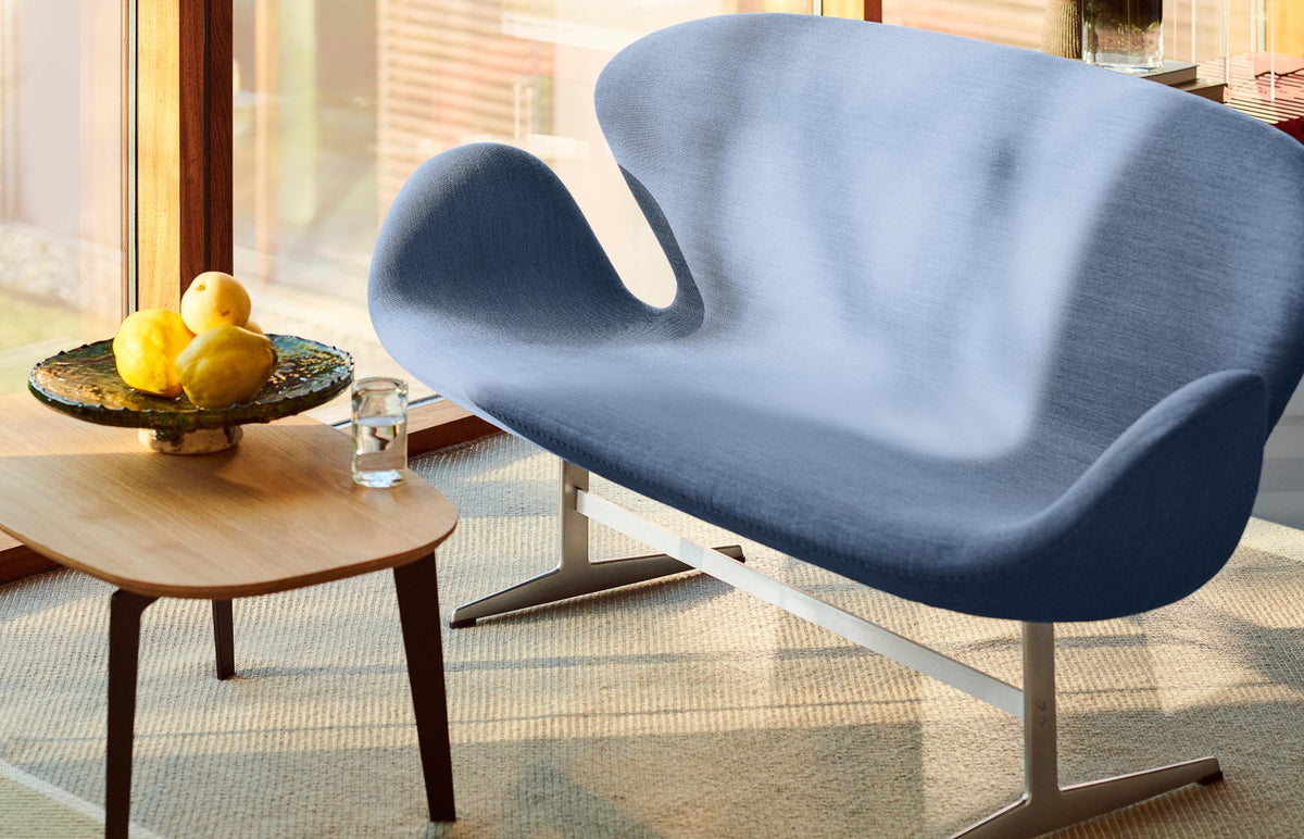 Swan Sofa by Fritz Hansen, showing swan sofa in live shot.