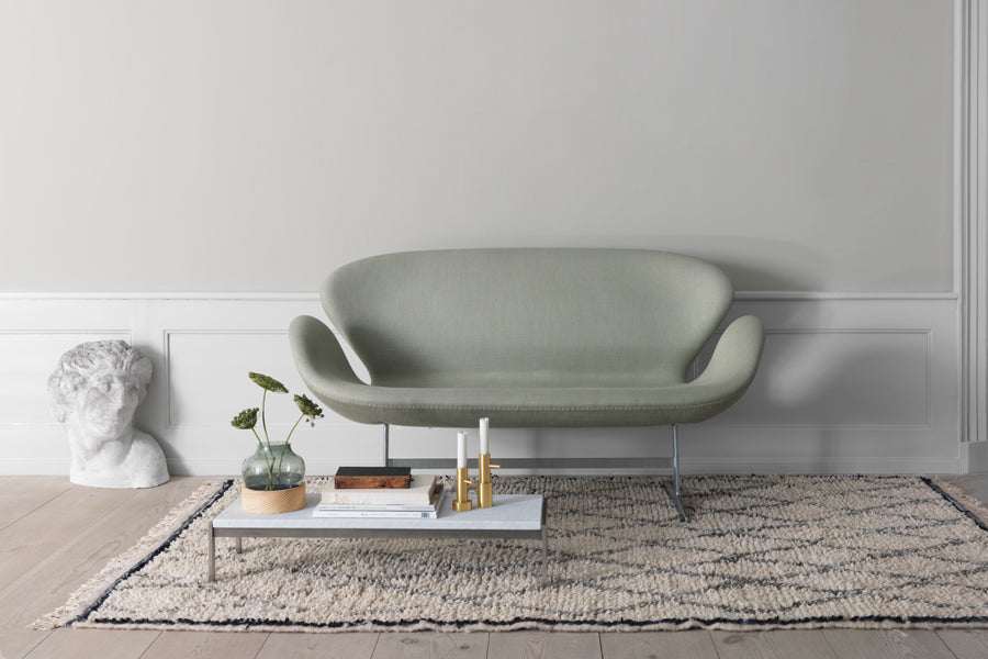 Swan Sofa by Fritz Hansen, showing swan sofa in live shot.