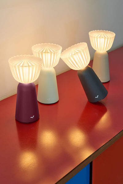 Swiing Lamp by Fermob, showing swiing lamp in live shot.