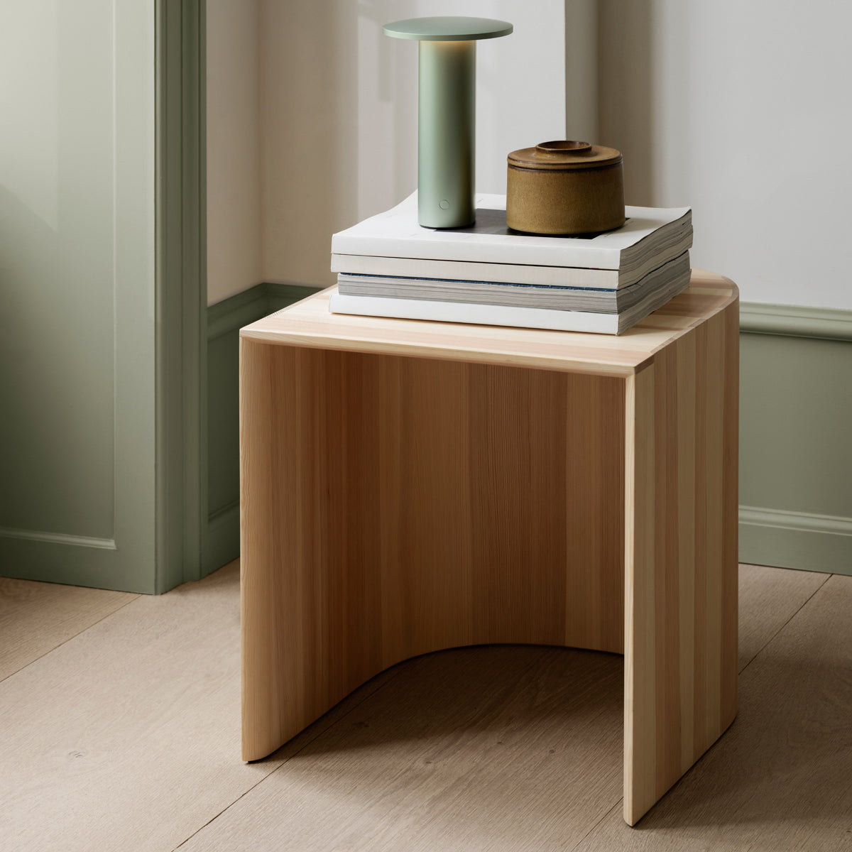 Taburet Stool/Side Table by Fritz Hansen, showing taburet stool/side table in live shot.
