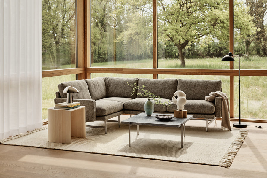 Taburet Stool/Side Table by Fritz Hansen, showing taburet stool/side table in live shot.