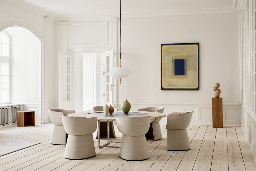 Taburet Stool/Side Table by Fritz Hansen, showing taburet stool/side table in live shot.
