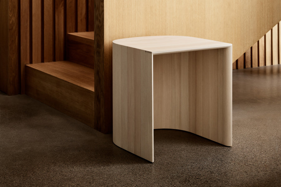 Taburet Stool/Side Table by Fritz Hansen, showing taburet stool/side table in live shot.