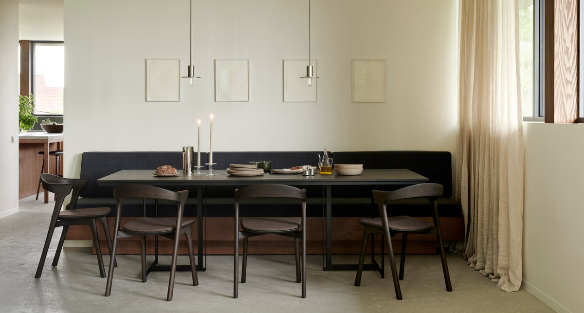 Tacet Dining Table by Ethnicraft, showing tacet dining table in live shot.
