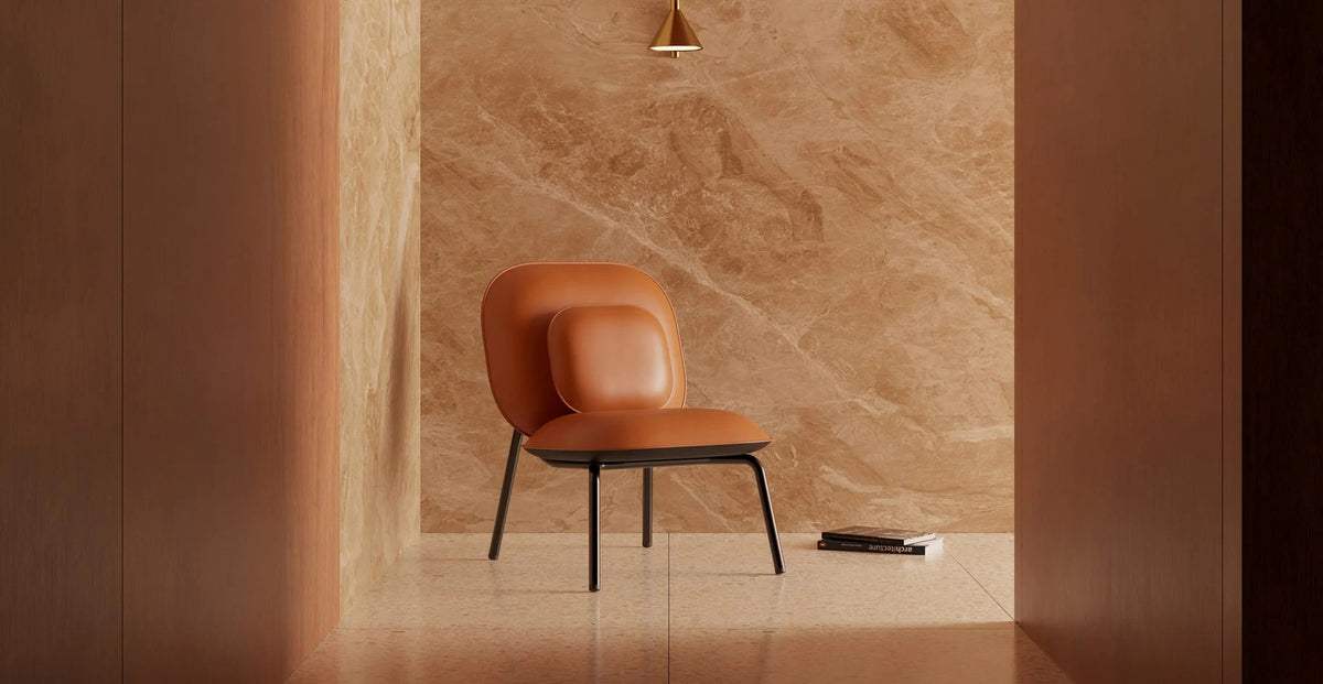 Tasca Pillow by Toou, showing tasca pillow with lounge chair in live shot.