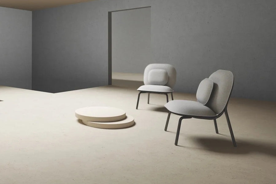 Tasca Pillow by Toou, showing tasca pillows with lounge chairs in live shot.
