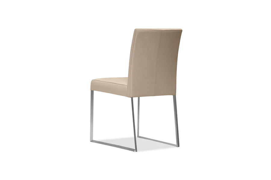 Tate Dining Chair by Mobital, showing back angle view of tate dining chair in wheat leather/brushed steel legs.