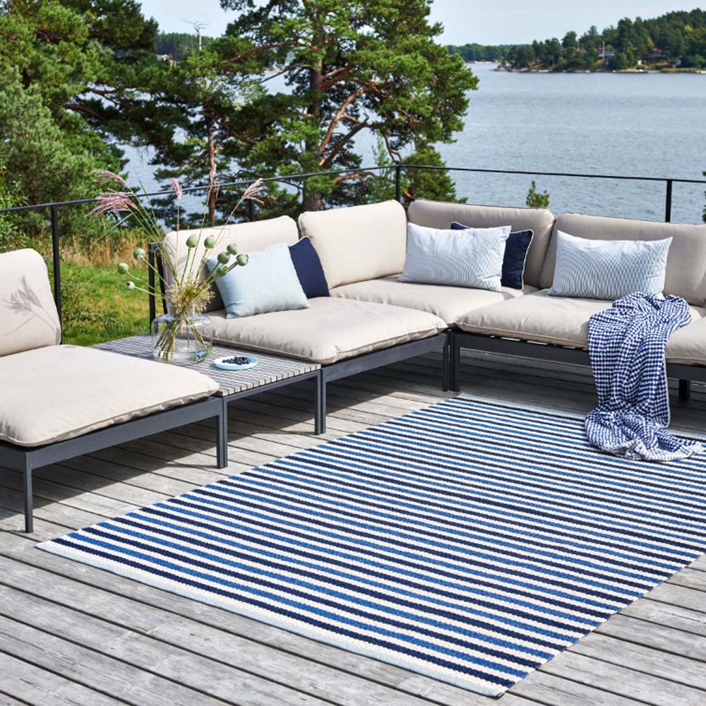 Teo Denim & Dark Blue with Vanilla Rug by Pappelina, showing teo denim & dark blue with vanilla rug in live shot.