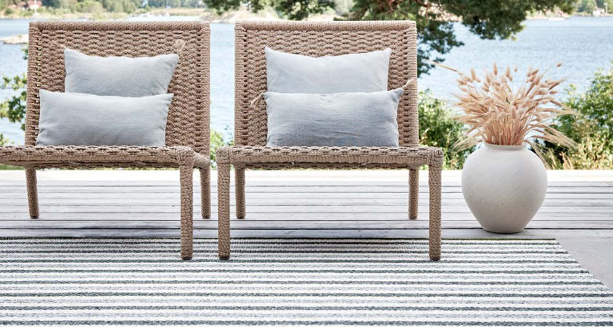 Teo Sage & Army with Vanilla Rug by Pappelina, showing teo sage & army with vanilla rug in live shot.