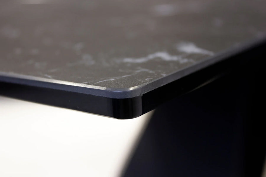The W Extending Dining Table by Mobital, showing closeup view of the w extending dining table in live shot.