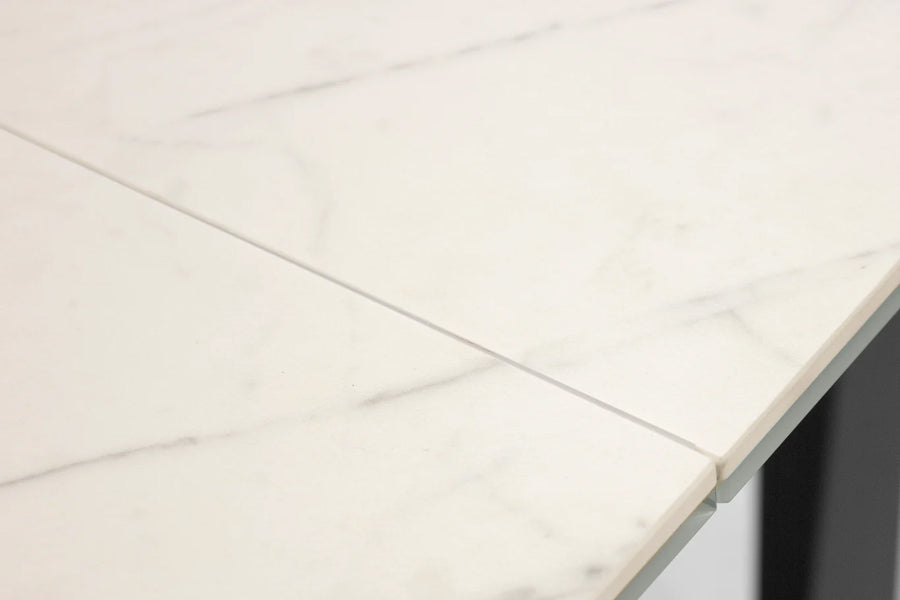 The W Extending Dining Table by Mobital, showing closeup view of the w extending dining table in live shot.