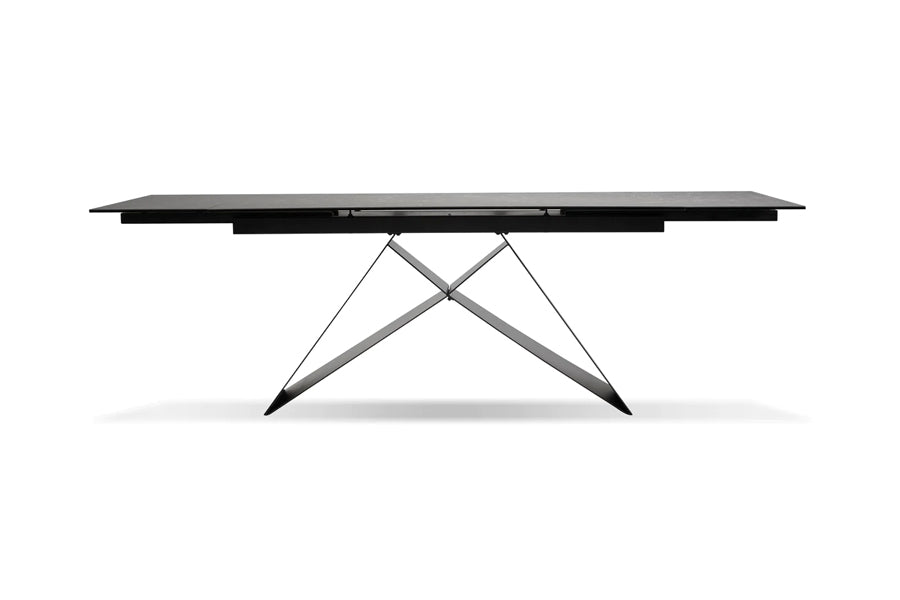 The W Extending Dining Table by Mobital, showing front view of the w extending dining table in slate ceramic tempered glass top/black powder coated base.