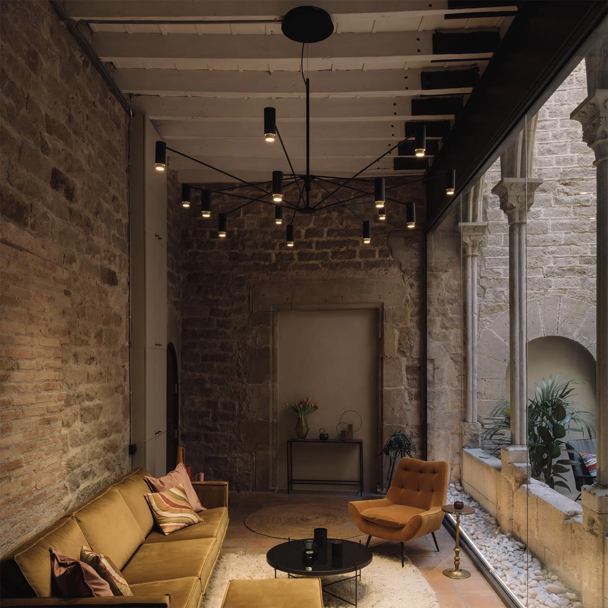 The W Pendant by Marset, showing the w pendant in live shot.