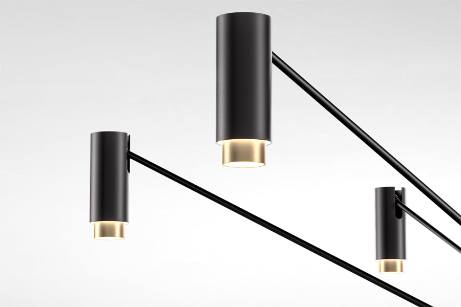 The W Pendant by Marset, showing closeup view of the w pendant in studio shot.