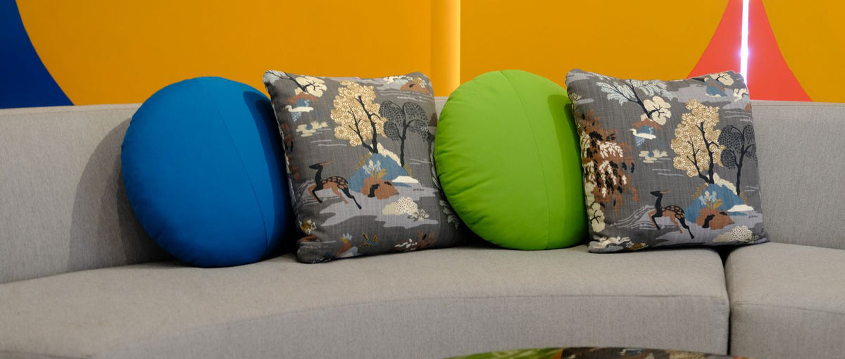Round/Triangle/Arc Throw Pillow by Bend, showing throw pillow accessories in live shot.