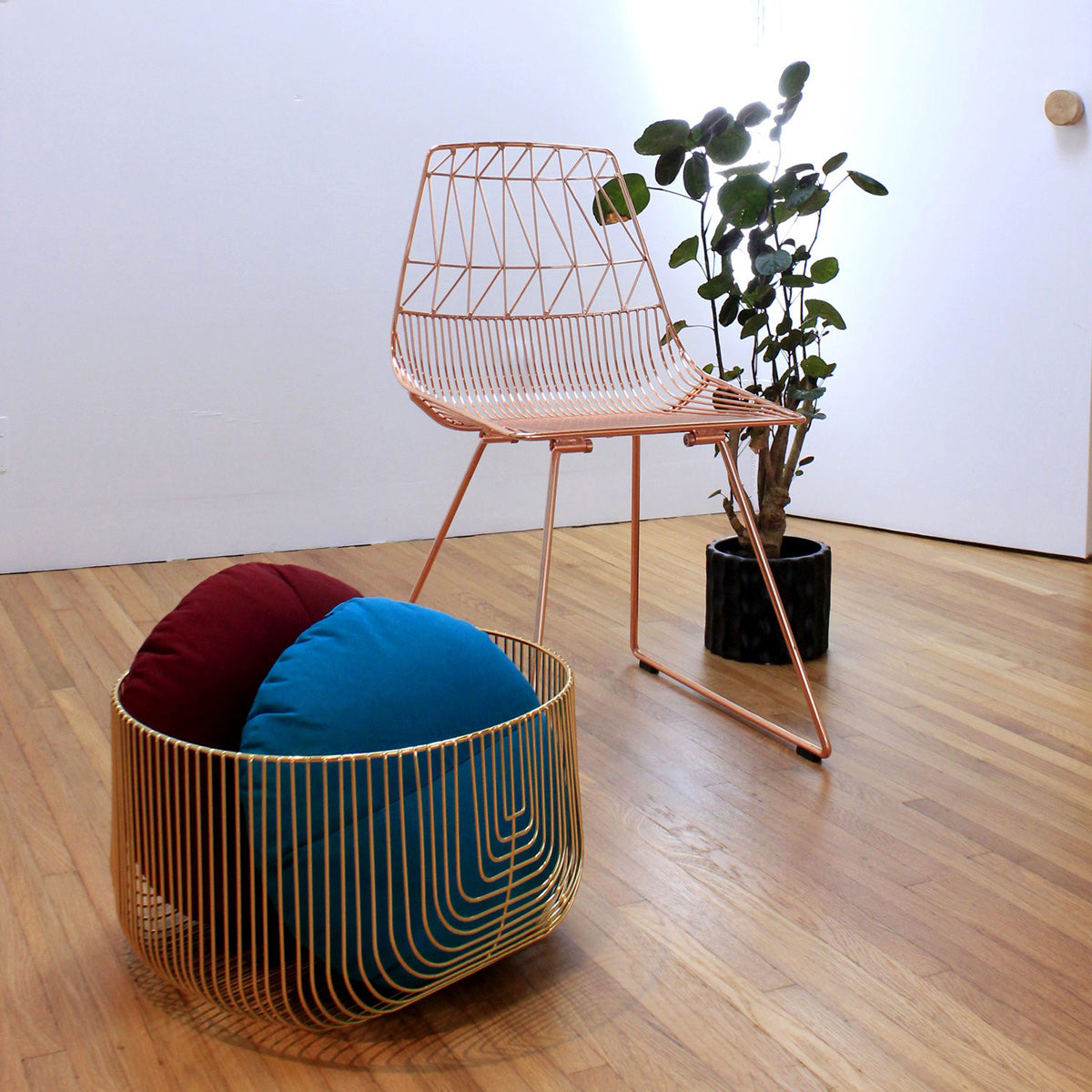 Round/Triangle/Arc Throw Pillow by Bend, showing throw pillow accessories in live shot.