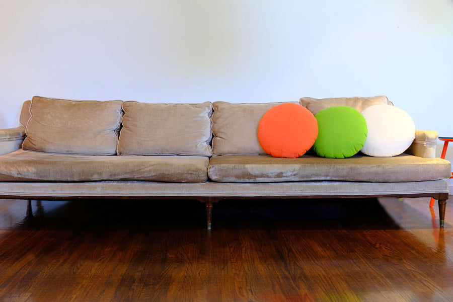 Round/Triangle/Arc Throw Pillow by Bend, showing throw pillow accessories in live shot.