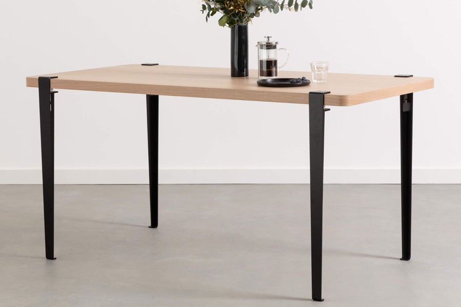 Tiptoe Dining Table by TipToe, showing tiptoe dining table in live shot.