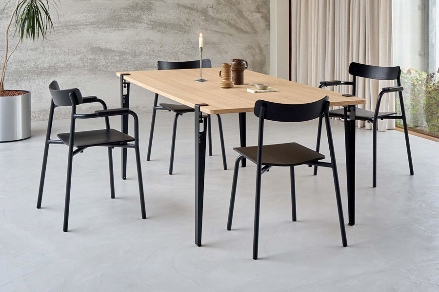 Tiptoe Dining Table by TipToe, showing tiptoe dining table in live shot.