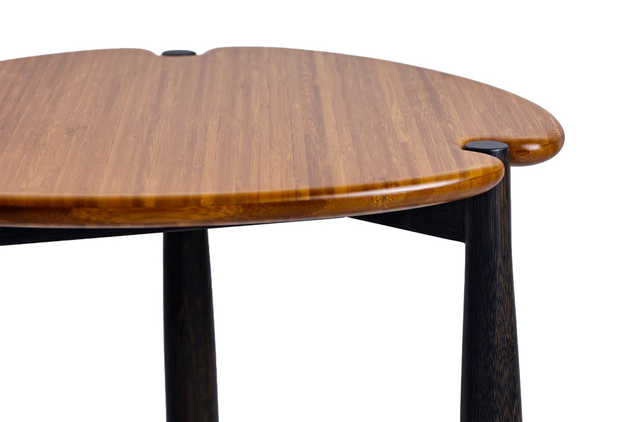 Tofino Side Table by Greenington, showing closeup view of tofino side table in amber + caviar.
