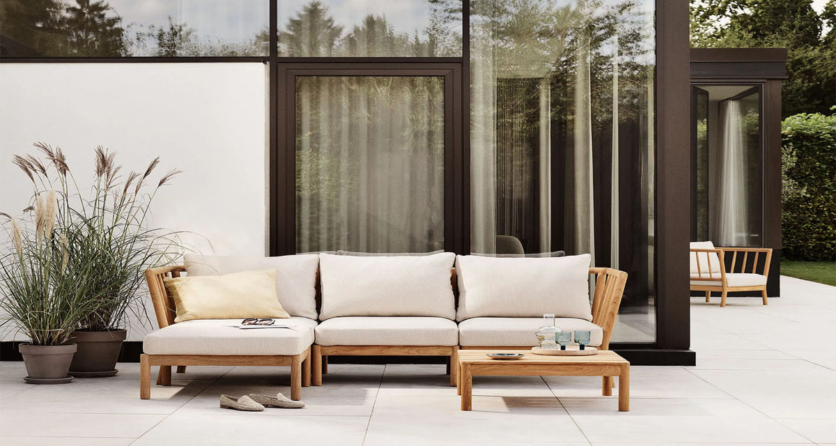 Tradition Lounge Table by Fritz Hansen, showing tradition lounge table in live shot.