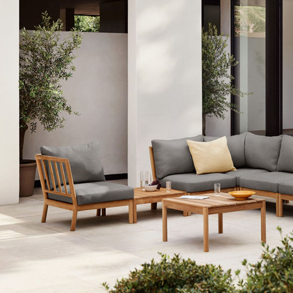 Tradition Lounge Table by Fritz Hansen, showing tradition lounge table in live shot.