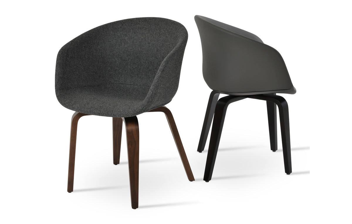 Tribeca Plywood Armchair by SohoConcept, showing angle view of tribeca plywood armchair in american walnut veneer/camira blazer dark grey wool with chair.