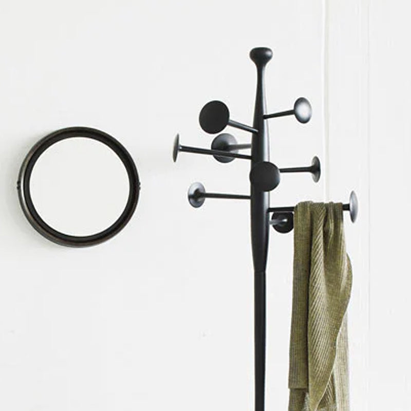 Trumpet Coat Stand by Mater, showing closeup view of trumpet coat stand in live shot.