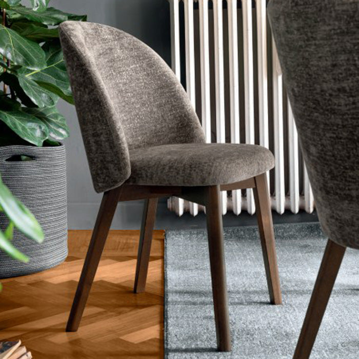 Tuka Mid Wood Frame Chair by Connubia, showing tuka mid wood frame chair in live shot.