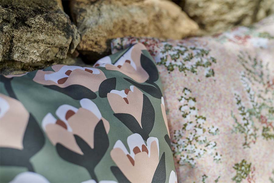 Tulip Outdoor Pillow by Fermob, showing tulip outdoor pillow in live shot.