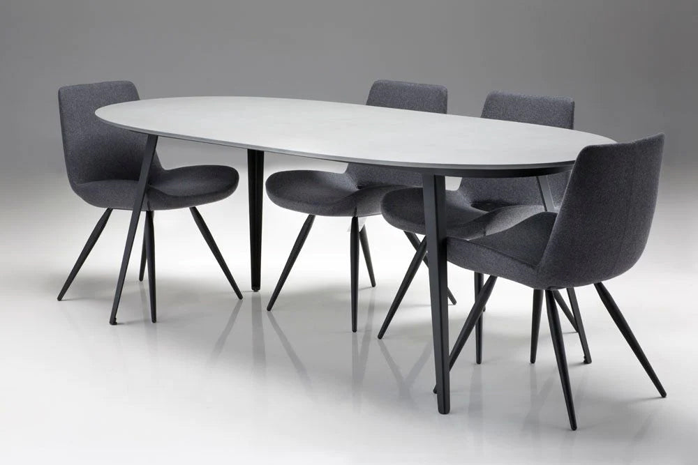 Tulum Dining Table by Mobital, showing tulum dining table with chairs in live shot.