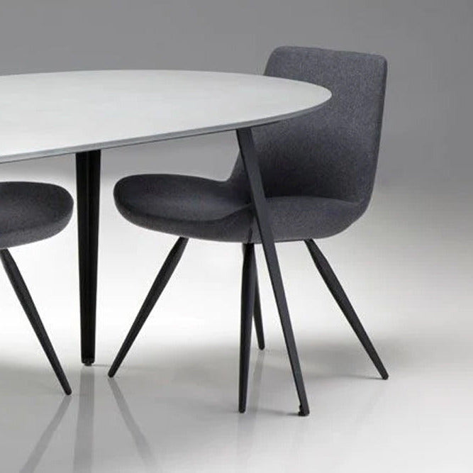 Tulum Dining Table by Mobital, showing closeup view of tulum dining table in live shot.