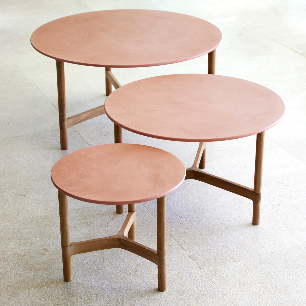 Twist Large Coffee Table by Cane-Line, showint twist large coffee table in live shot.