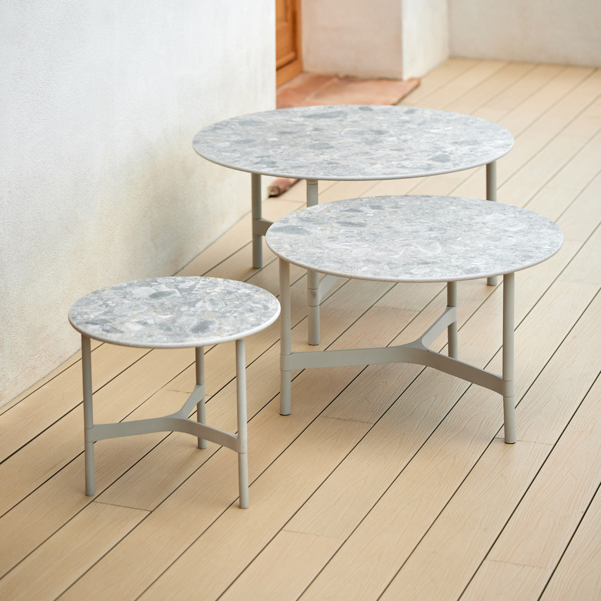 Twist Large Coffee Table by Cane-Line, showint twist large coffee table in live shot.
