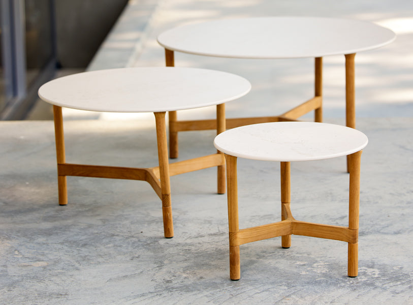 Twist Large Coffee Table by Cane-Line, showint twist large coffee table in live shot.