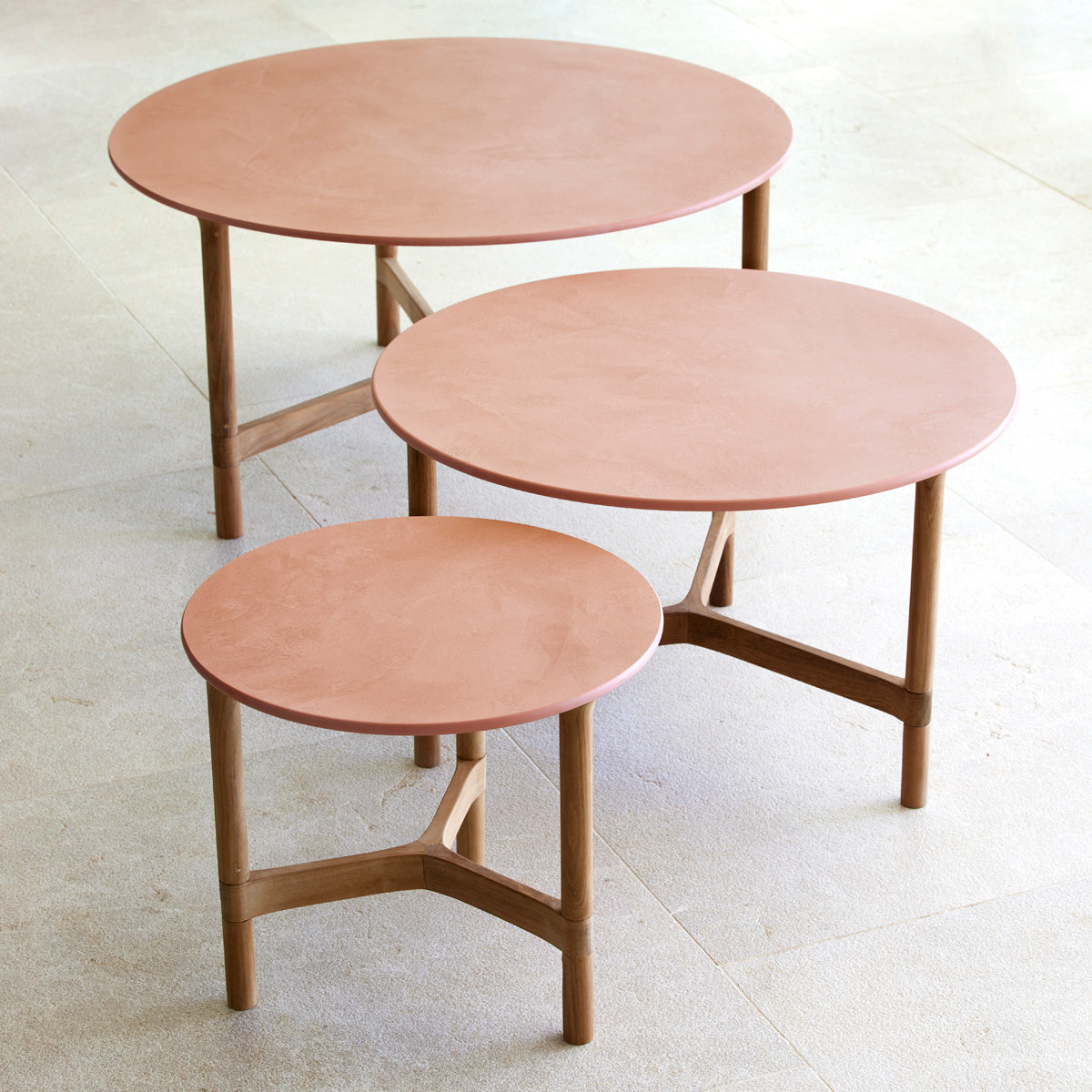 Twist Medium Coffee Table by Cane-Line, showing twist medium coffee table in live shot.
