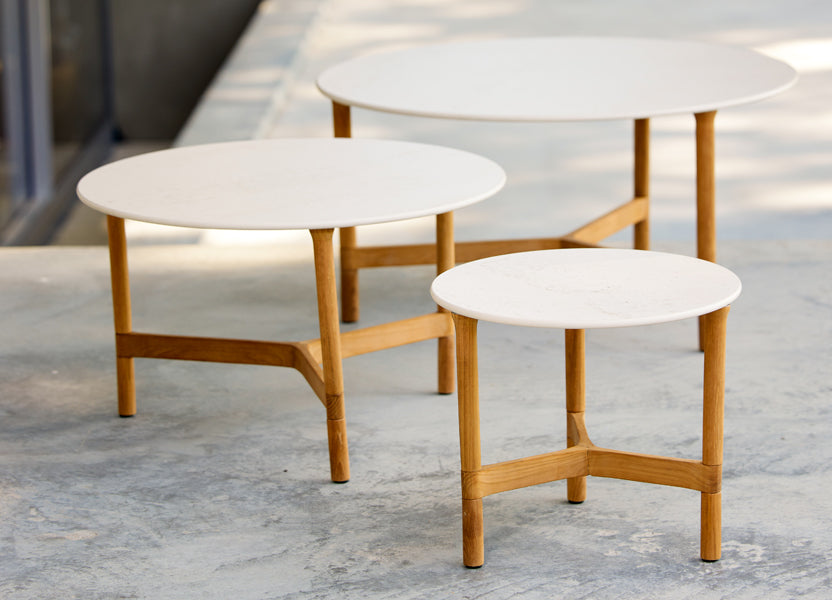 Twist Medium Coffee Table by Cane-Line, showing twist medium coffee table in live shot.
